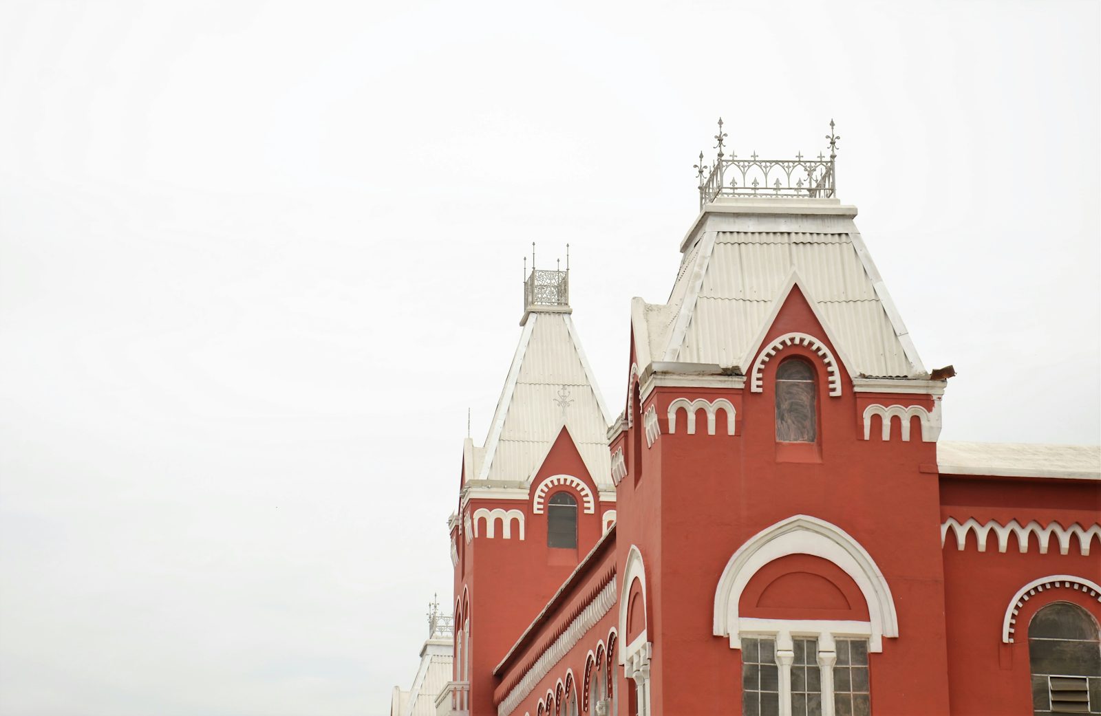 A red and white landmark building, Chennai