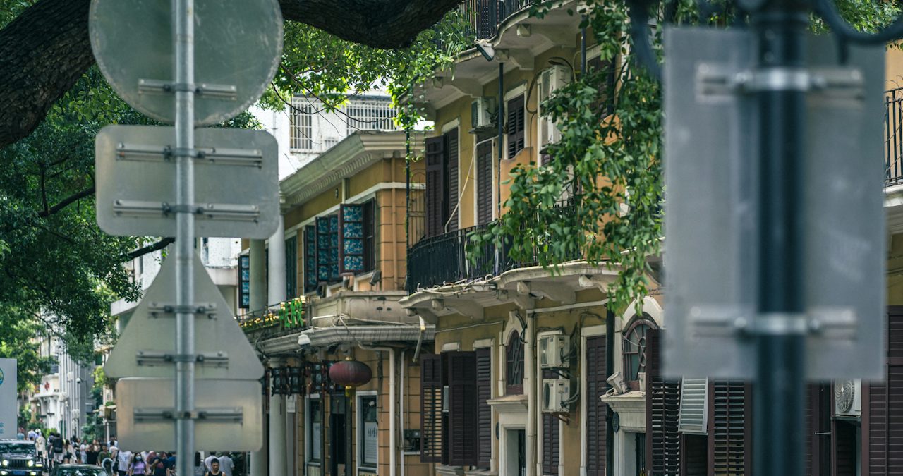 A row of historic arcade buildings along a street, Guangzhou