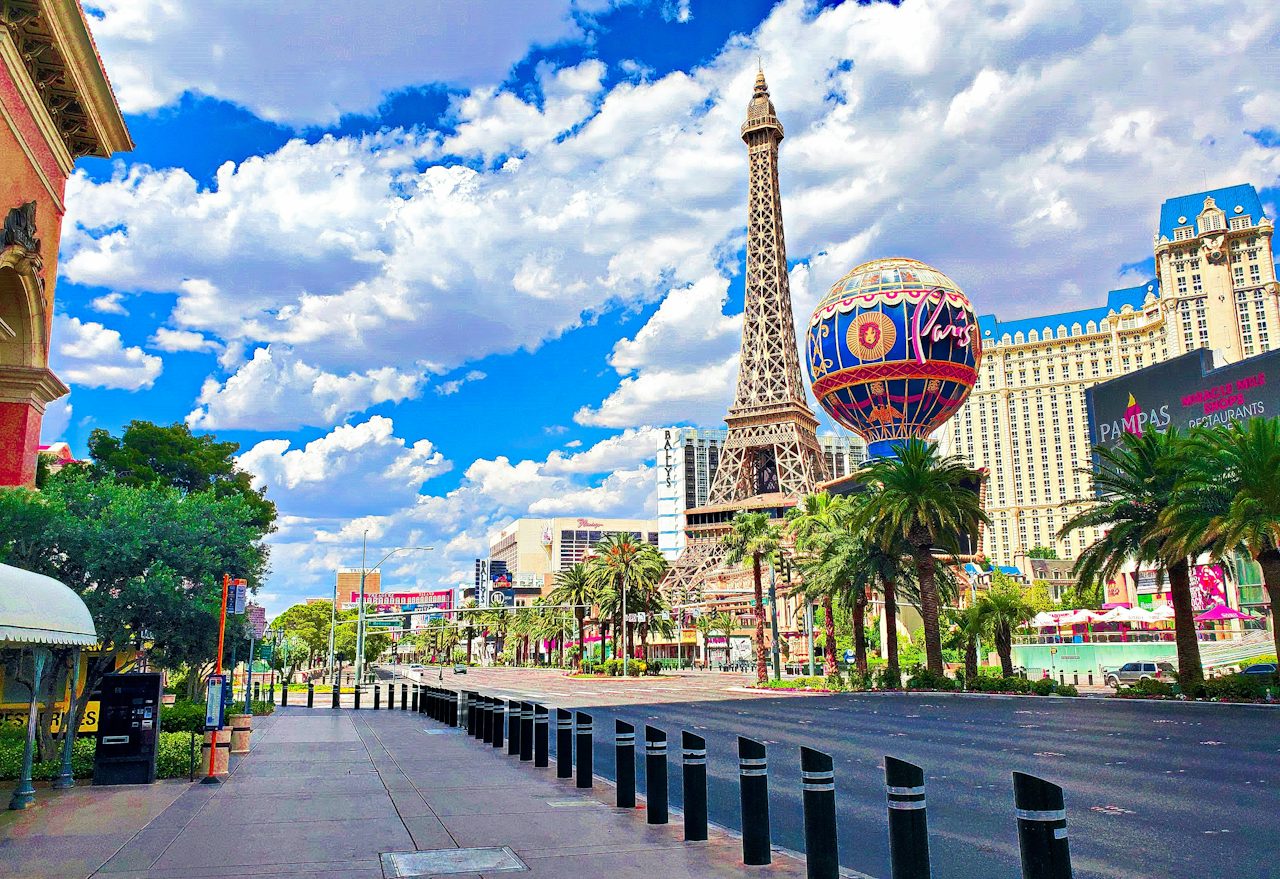 Las Vegas Boulevard and the Paris hotel tower under blue sky, Las Vegas