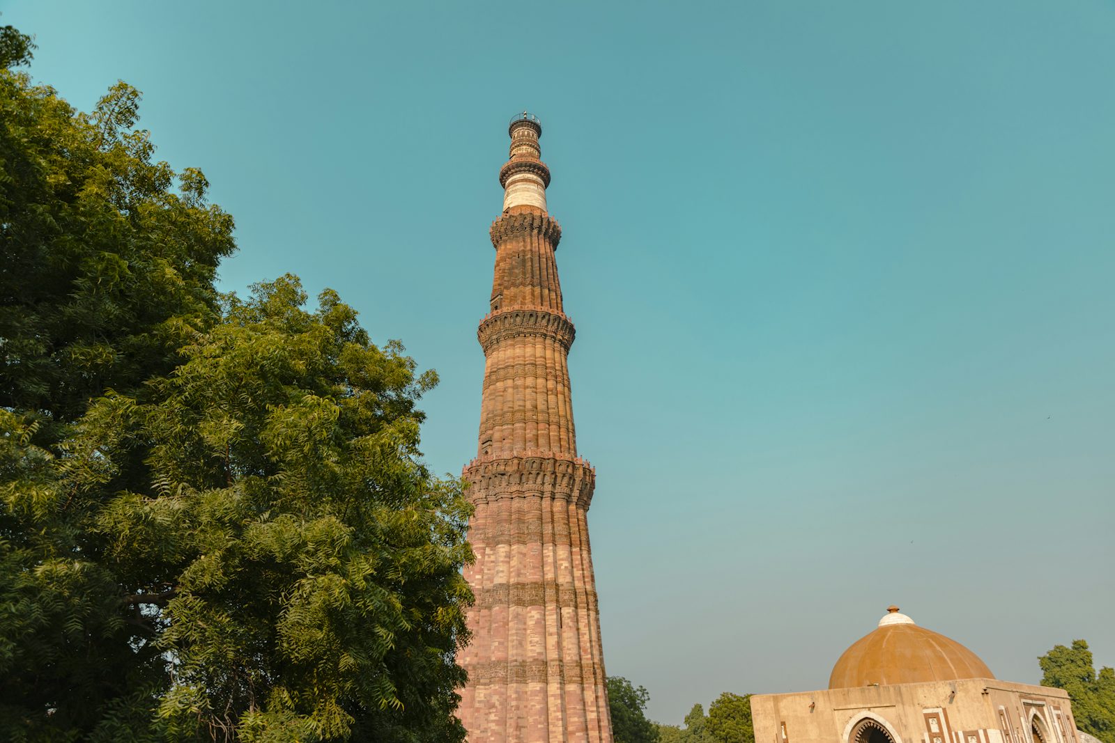 Qutub Minar among trees, Delhi