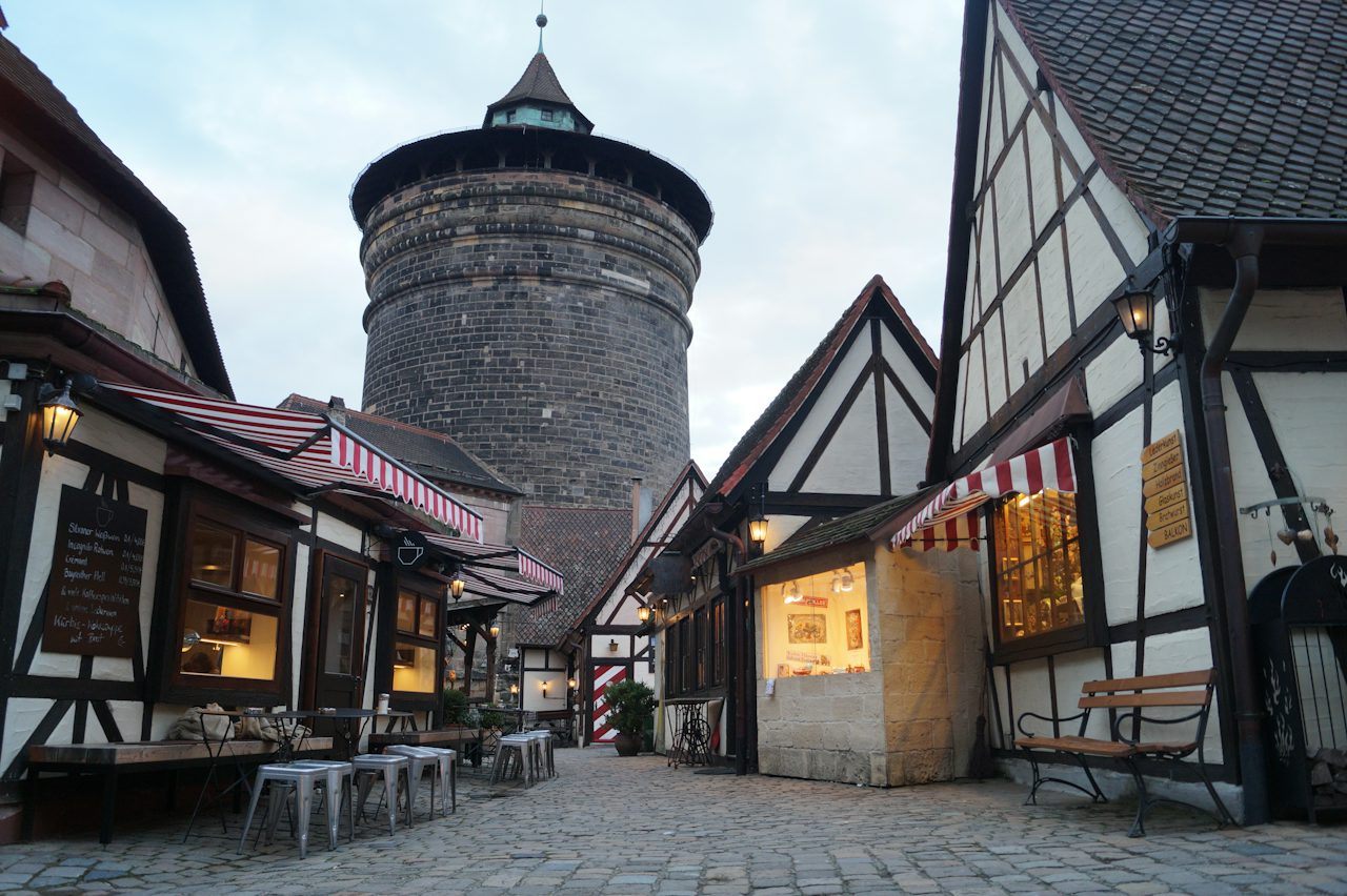 People walking a street in the old town by day, Nuremberg
