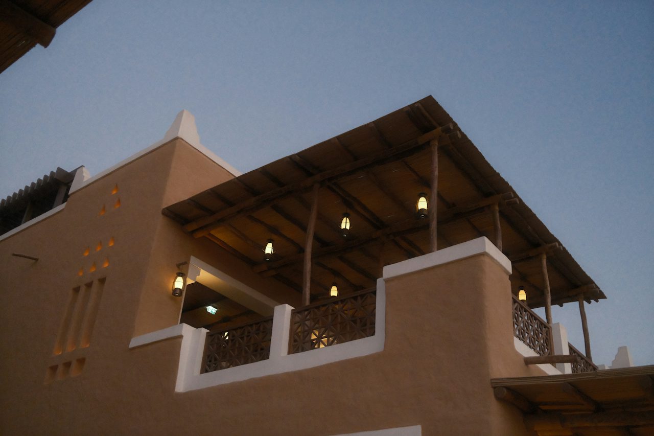 A traditional mud-brick building with lanterns in Diriyah, Riyadh